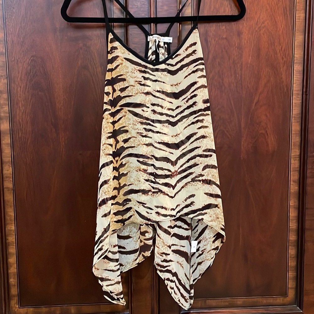 Hanger thin striped tiger print, sheer, split open back. Size small.